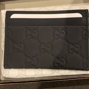 Brand new Authentic Gucci signature card holder.
